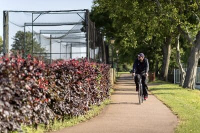 Staff member on bike