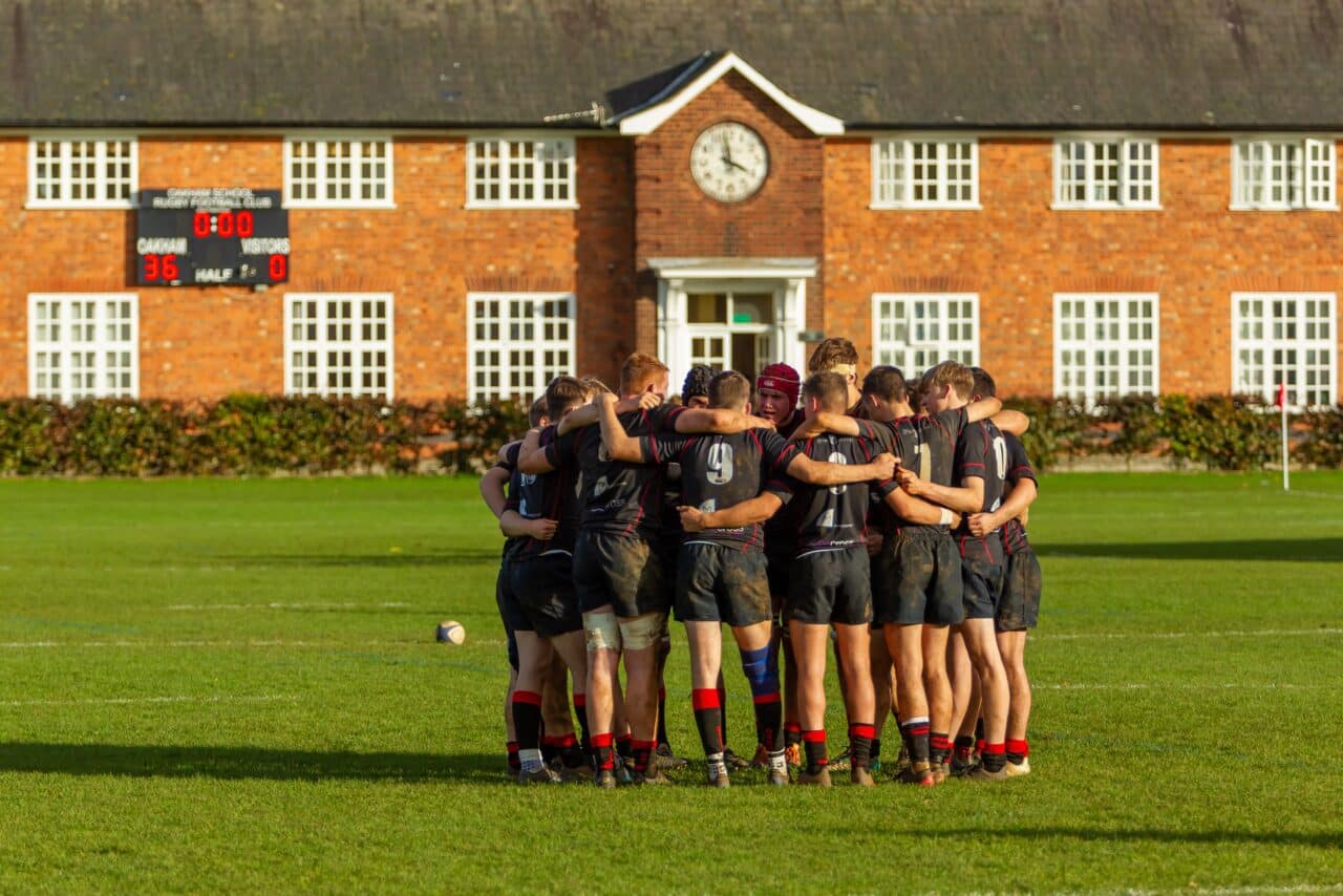 Rugby huddle on Doncaster Close