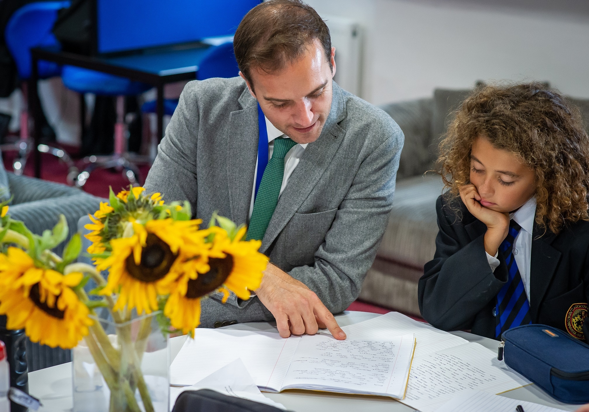 Sargants Teacher helping pupil with homework