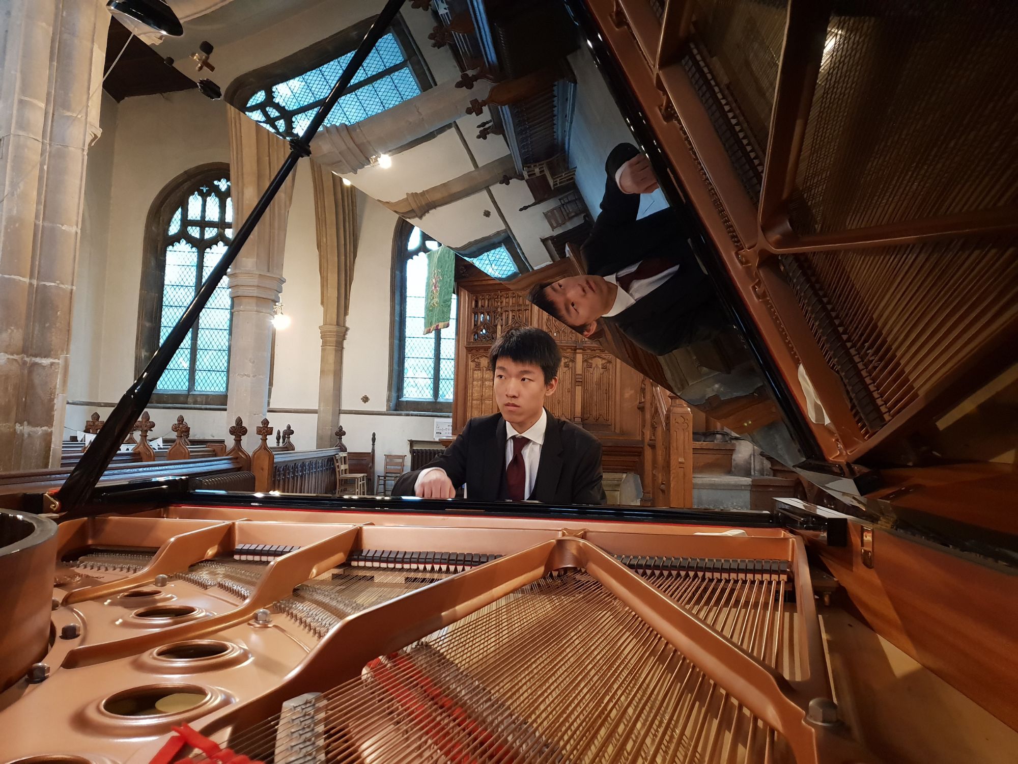 Oakham school pupil playing the piano