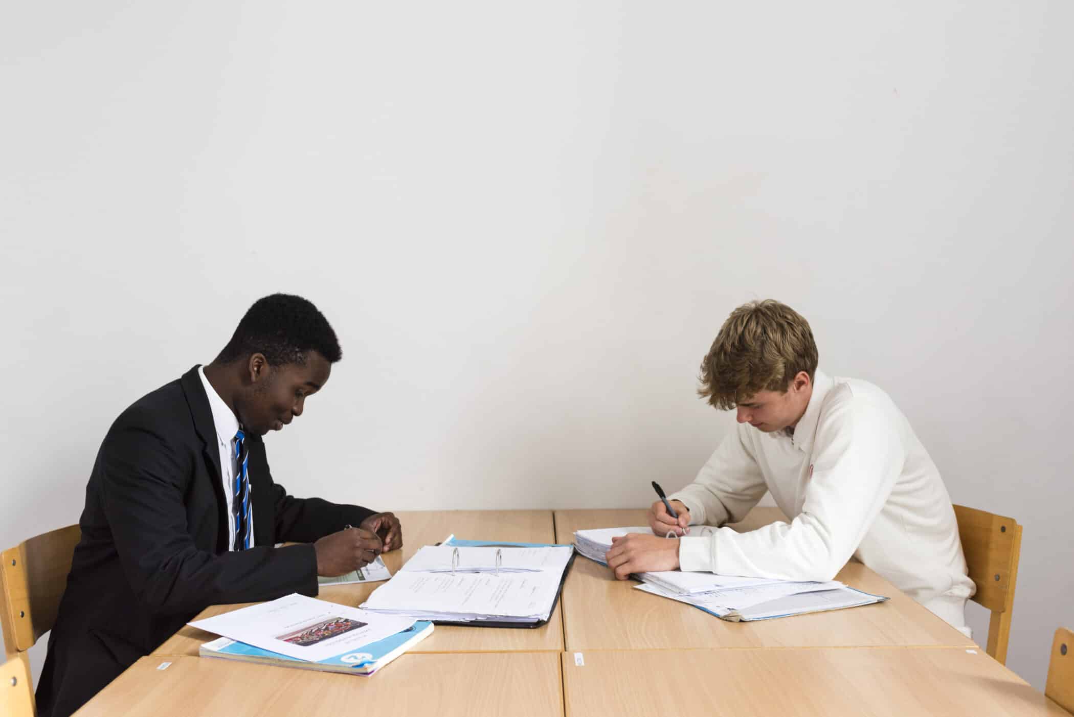 Clipsham House Boys sitting at desk