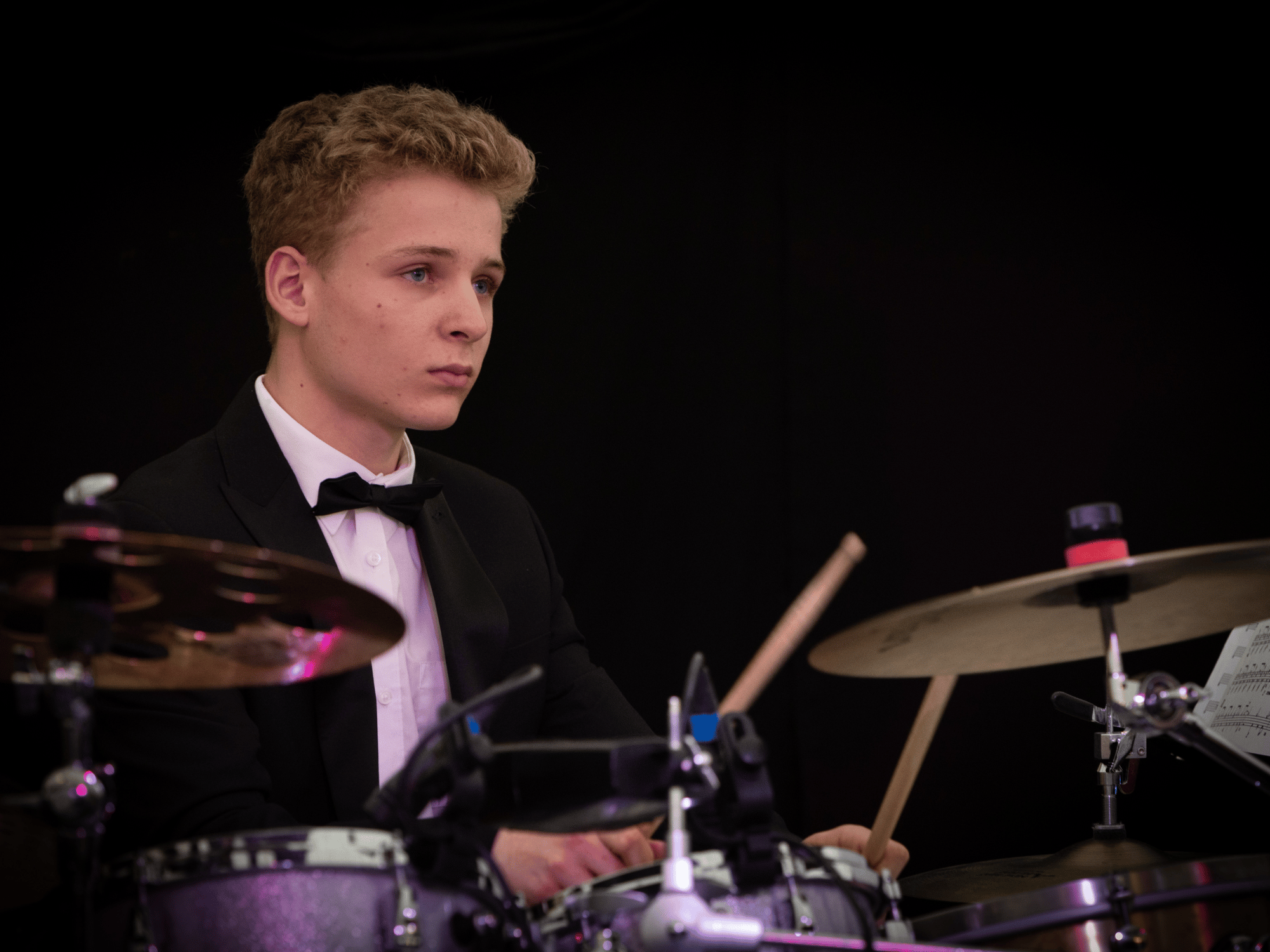 Oakham student plays drum kit in concert