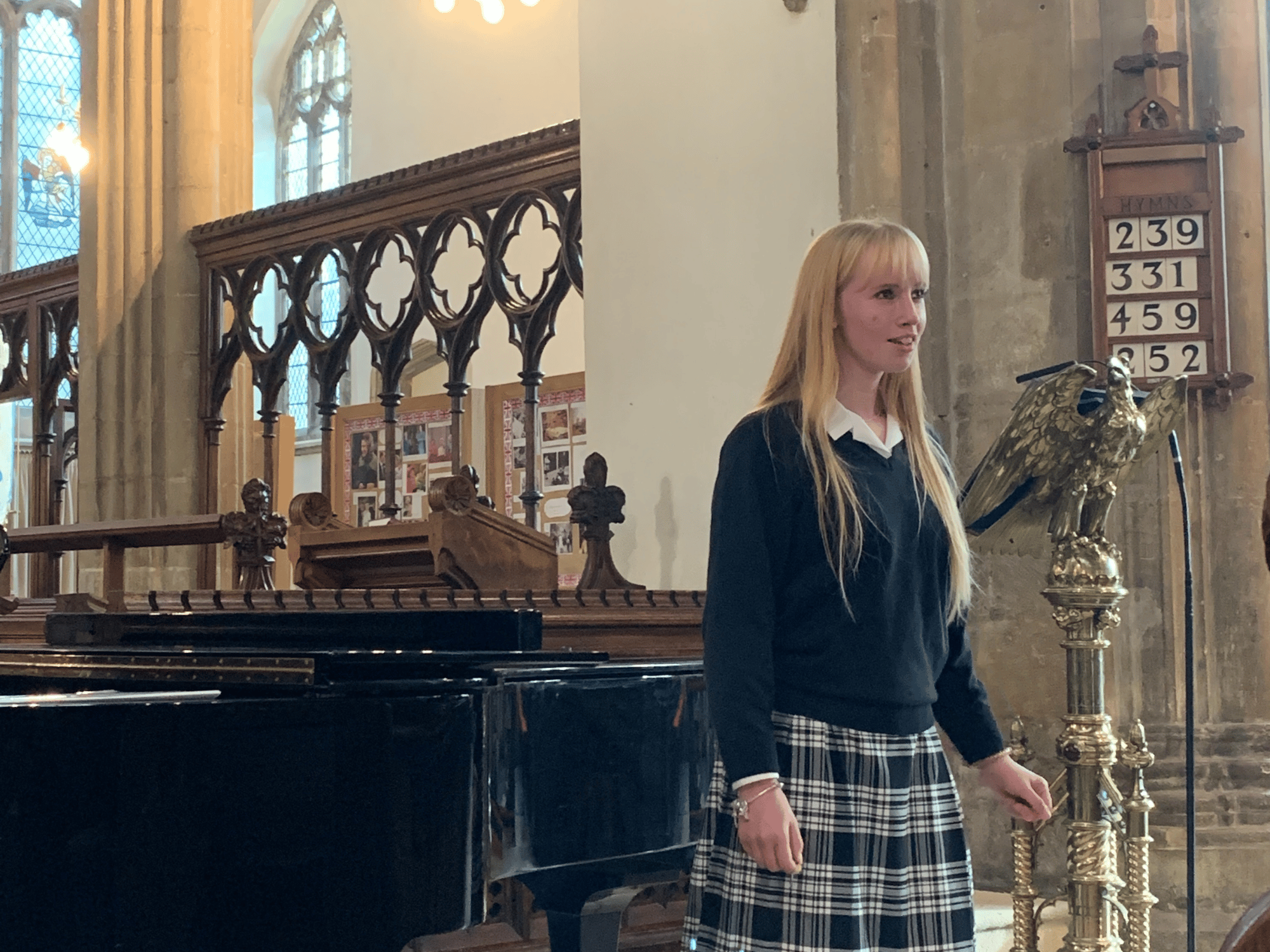 Student sings in a church