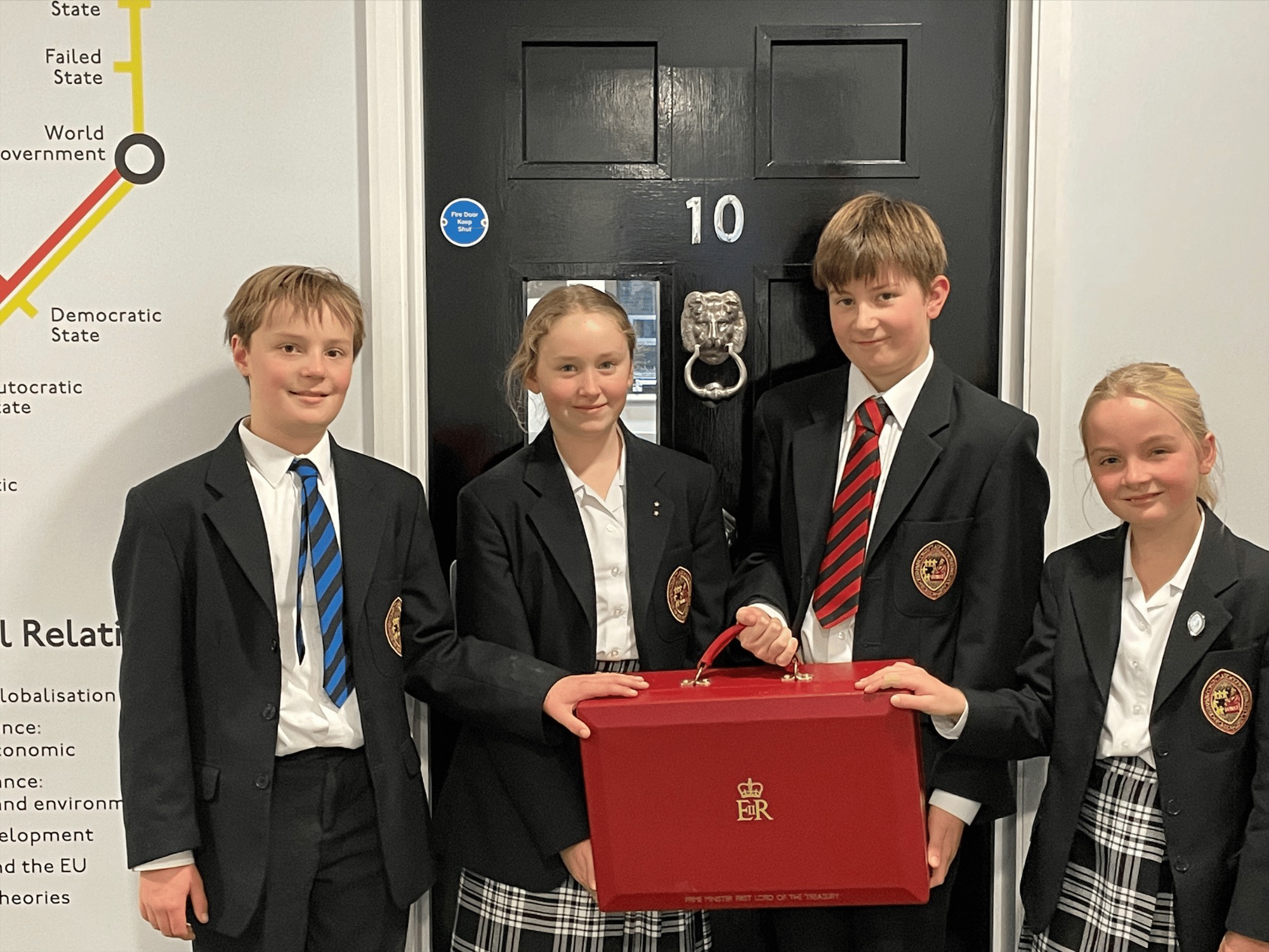 Lower School Pupils standing with the red box