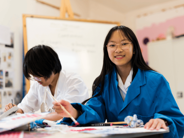 A pupil enjoying an Art class