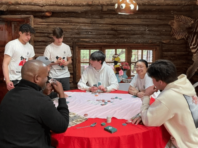 Kenya trip - pupils playing games in their lodge