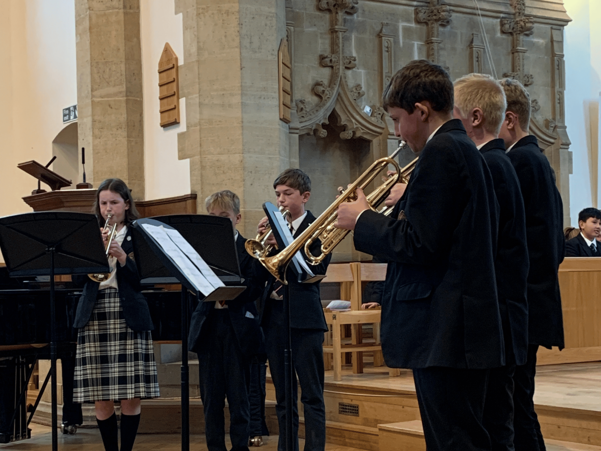 Lower School students play in brass group in concert