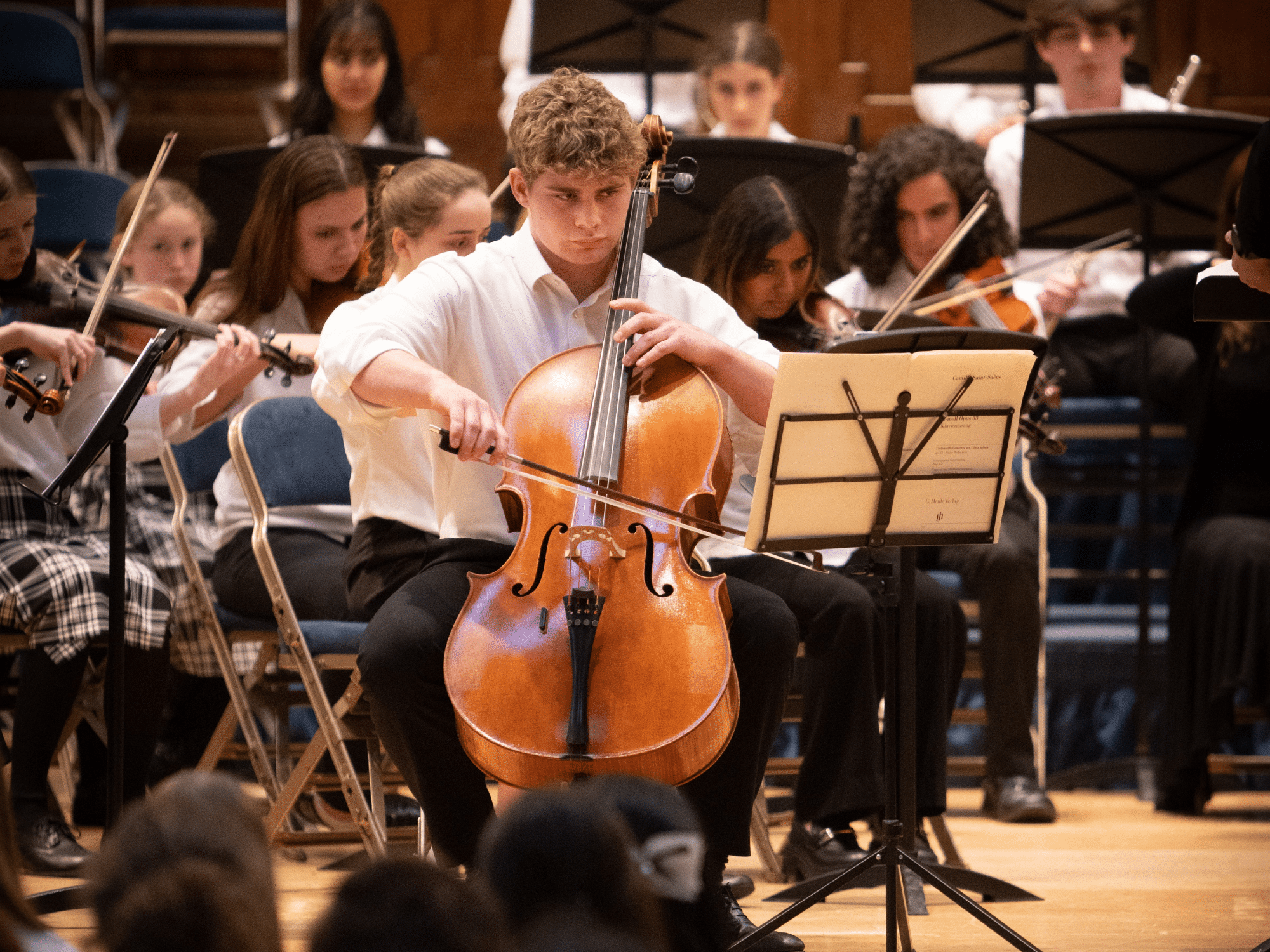 Close-up of student playing cello