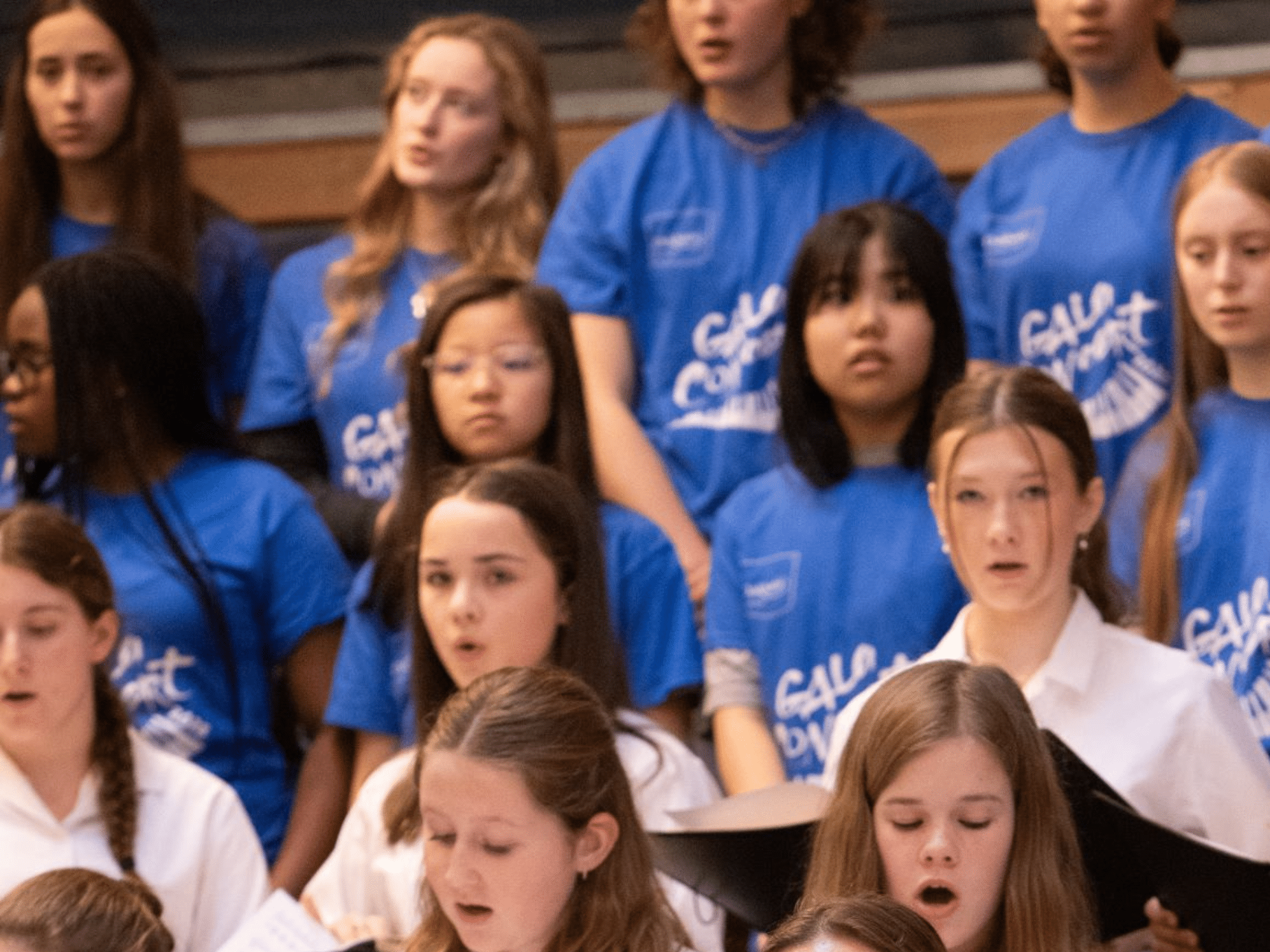 Photo of students singing in choir