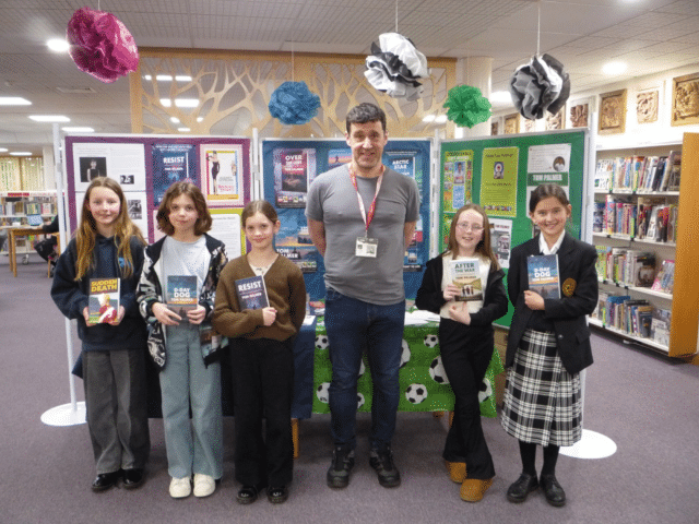 Author Tom Palmer and pupils