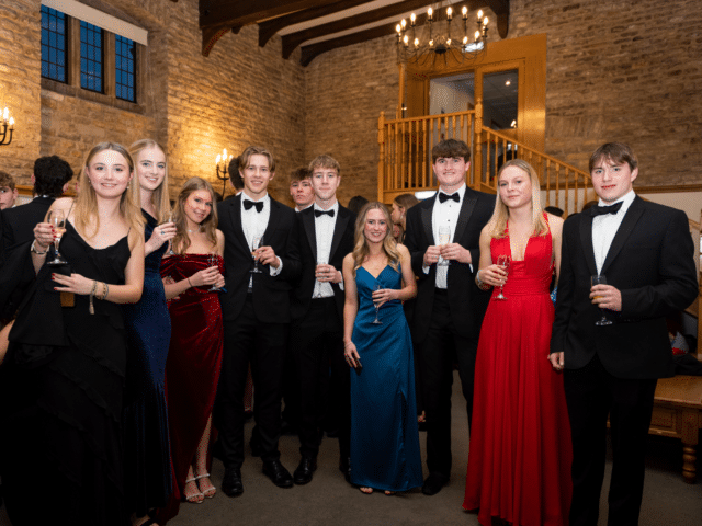 Group of pupils dressed up for Black tie dinner