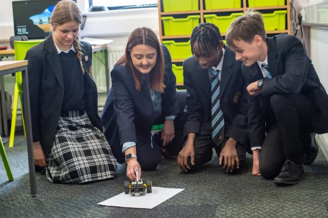 Natasja Deacon teaching Computer Science with pupils