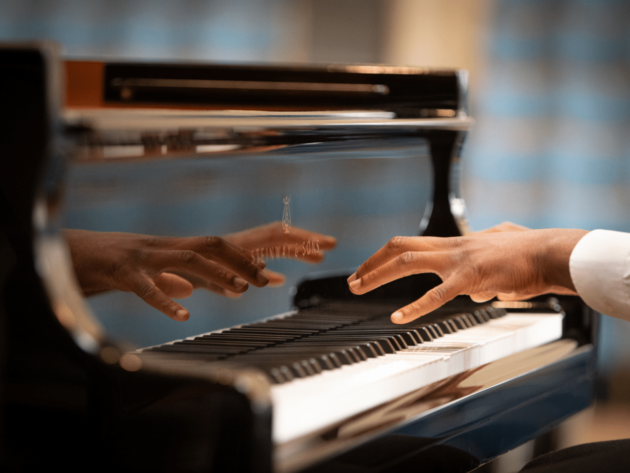 Hands on piano