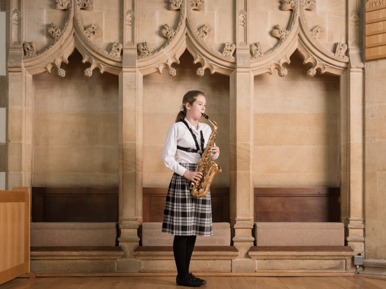 Student plays alto sax