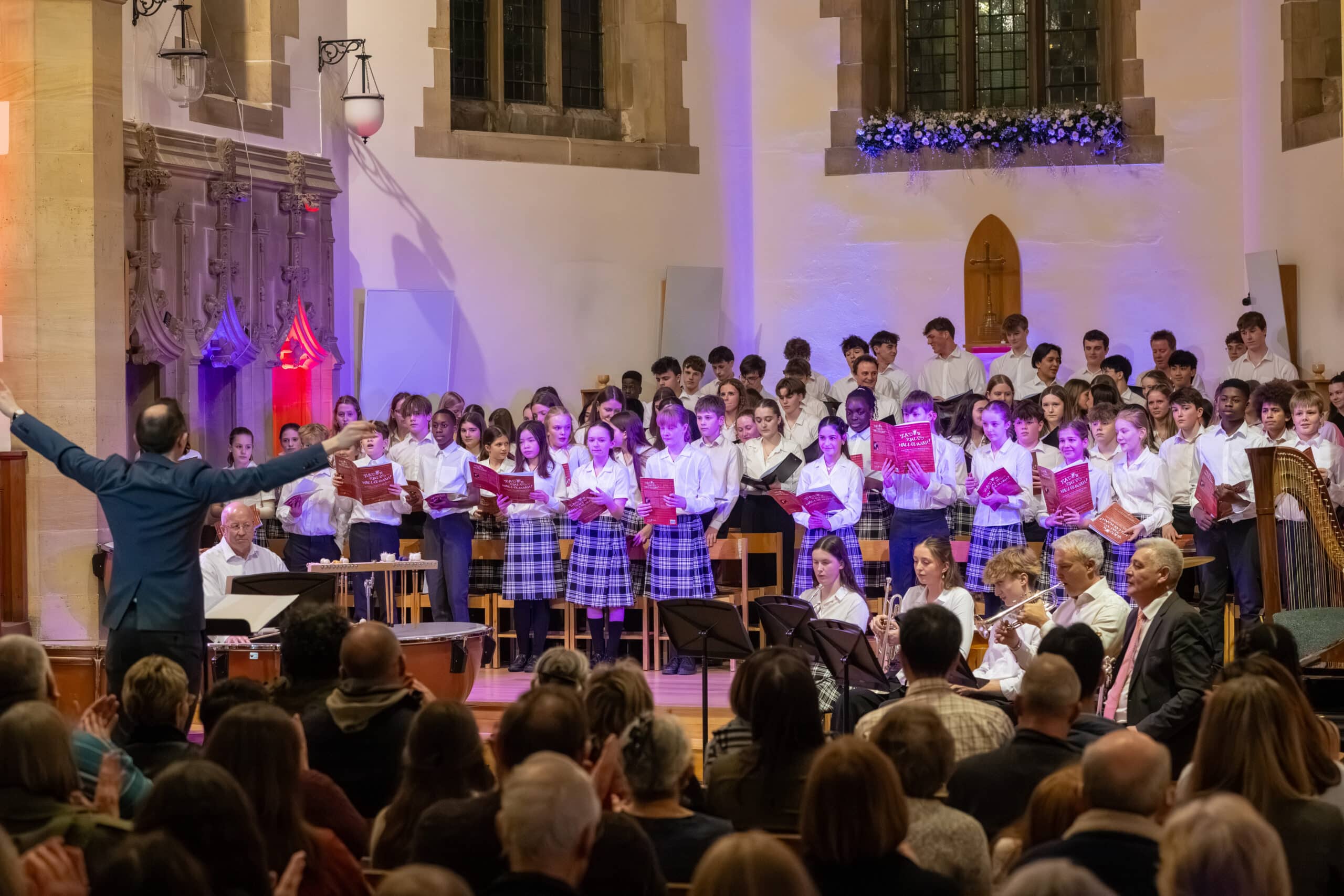 Lower School Choir, Chapel Choir, John Mountford, Director of Music and members of the Concert Band playing at the Gala Concert in the Chapel.
